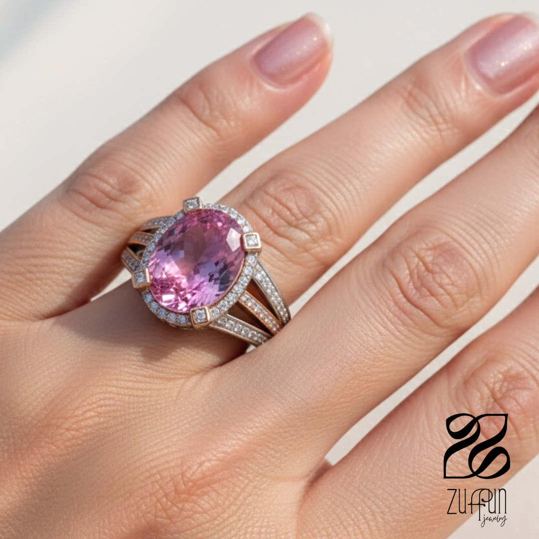 Pink gemstone ring on a hand with Zuffun branding
